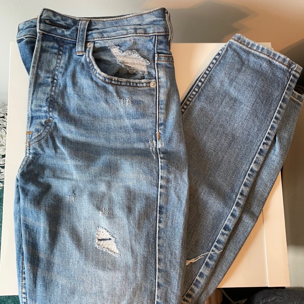 Ripped and distressed straight skinny jeans.